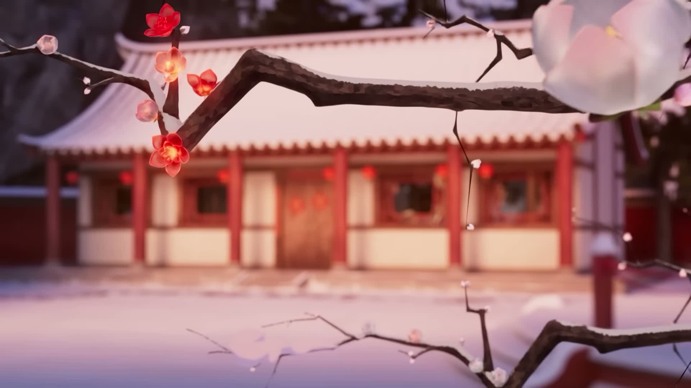 A snow-covered house behind a bare branch