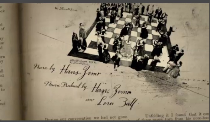 Sherlock Holmes: A Game of Shadows — crew title card on a sheet-music page